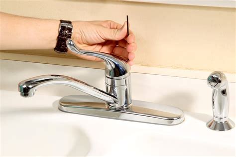 moen kitchen faucet leaking from base of spout|How To Repair a Moen Kitchen Faucet: Step